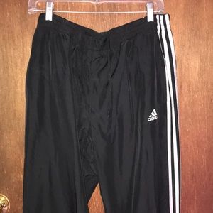 Adidas track pants black with off-white stripes